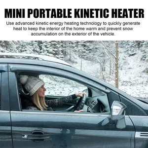 Mini portable kinetic heater being used in a vehicle during a cold snowy winter