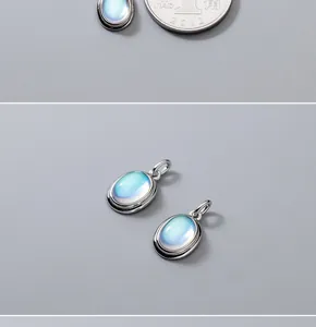 Detailed macro view of blue moonstone charms in sterling silver for DIY jewelry crafts.