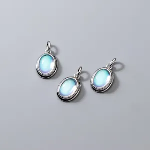 Elegant S925 silver oval moonstone pendant with iridescent blue glow for DIY jewelry