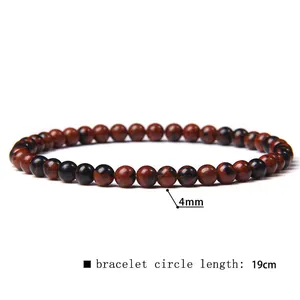 Detailed macro view of 4mm mahogany obsidian stone bead bracelet measuring 19cm in length.