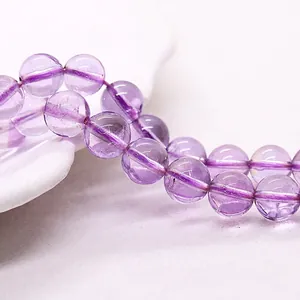 Macro view of natural lavender purple amethyst loose beads for DIY jewelry making craft