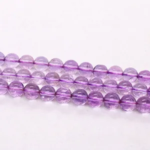 Macro view of natural lavender amethyst round beads for DIY jewelry making accessories