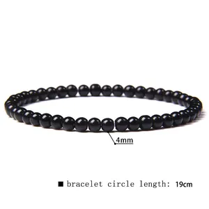 Detail view of a 4mm black stone bead bracelet with a 19cm circumference.