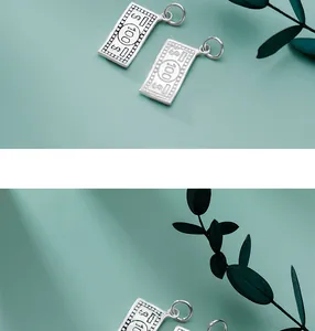 Detailed close-up of S925 sterling silver 100 dollar bill pendant with engraved details.