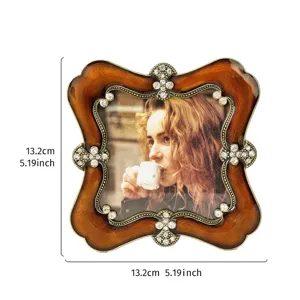 Vintage European style square picture frame with amber enamel and rhinestone flower accents