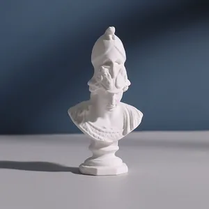 Macro detail of a white mini Greek mythological god bust sculpture for elegant home decor