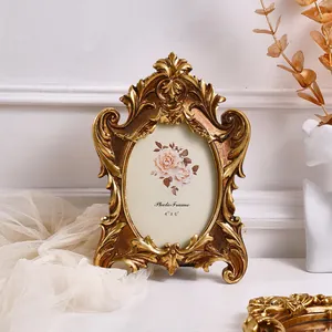 Antique gold ornate oval photo frame with baroque style floral carvings for 4x6 inch photos