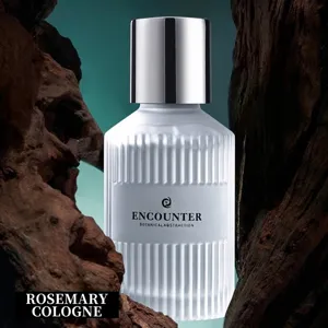 High-end car perfume in a ribbed frosted white glass bottle with a silver cap.