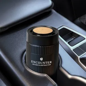 Luxury car solid air freshener perfume balm in a sleek black grooved container