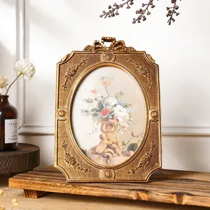 Vintage Europäischer Stil Gold Harz Fotorahmen mit geprägten Blumendetails für Deko
