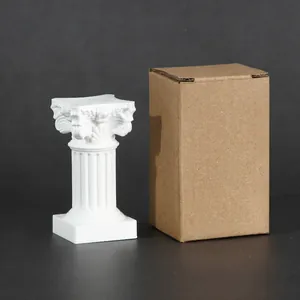 White resin Roman column pedestal shown next to its brown kraft paper packaging box