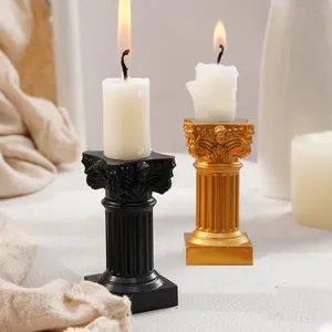 Elegant Nordic Roman column candle holders in black and gold for artistic home decor