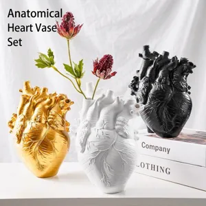Detailed anatomical heart-shaped resin vase showing realistic veins and texture