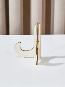 Side profile of a minimalist wooden display stand for decorative plates and craft plaques.