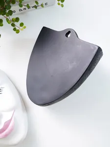 Back view of black face-shaped resin wall planter with integrated hanging hole