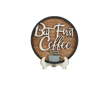 Rustic wooden But First Coffee round plaque sign with white desktop display stand