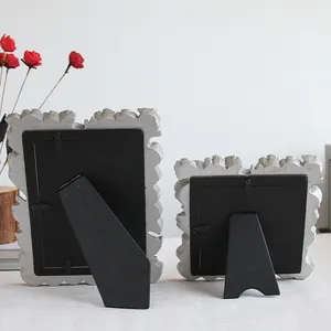 Detailed back view of resin ginkgo leaf photo frames with sturdy tabletop stands