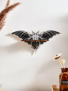 Gothic bat-shaped wall shelf with white and black wing details