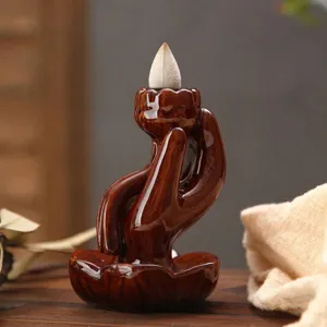 Bruciatore d'incenso a riflusso Zen a forma di mano di Buddha in resina lucida