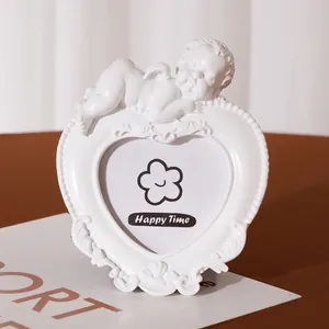 European retro white resin heart-shaped photo frame with sleeping angel ornament