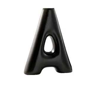 Minimalist black resin A-shaped decorative vase for home and office desktop decor