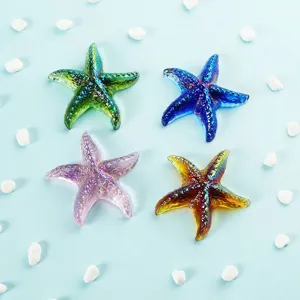 Set de cuatro estrellas de mar de cristal iridiscente para decoración