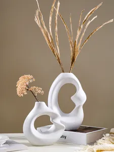 Artistic white resin vases with abstract spiral shape for Nordic home decor