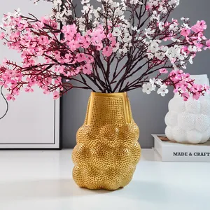 Goldene strukturierte Vase aus Harz mit Blasenmuster für elegante Heimdekoration