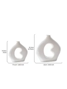 Detaillierte Maße minimalistischer weißer Keramikvasen in Bohnenform für Dekoration.