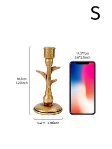 Detail view showing dimensions of antique gold palm tree candle holder for home decor
