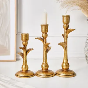Vintage gold coconut leaf candle holders set for elegant wedding dining table decor