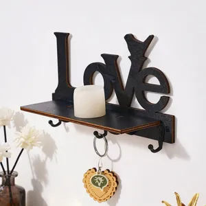 Wooden wall-mounted shelf with LOVE lettering and bird hooks for home decor