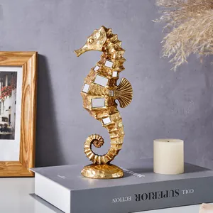 Modern luxury golden resin seahorse figurine with mirror insets for home tabletop decor