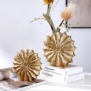 Modern minimalist golden seashell resin vase set for sophisticated home interior decor