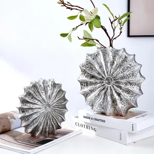 Modern silver conch resin vases for elegant minimalist home decor and floral arrangements