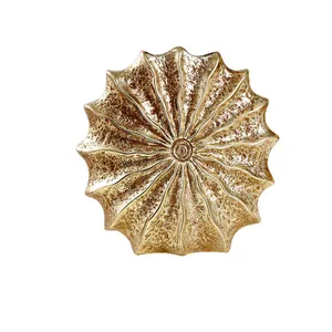 Elegant modern gold seashell-shaped resin vase for minimalist home decor and flowers