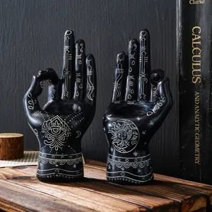 Retro mystic resin hand statue candle holder with white palmistry symbols for decor