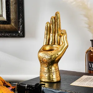 Golden mystical resin hand palmistry ornament candle holder with sun pattern engraving