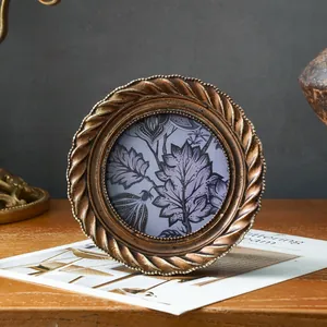 Europäischer runder Fotorahmen in Vintage-Gold mit spiralförmigem Rand für Wohndekoration