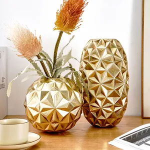 Elegante Noordse gouden vazen met geometrisch ananaspatroon voor moderne bloemendecor