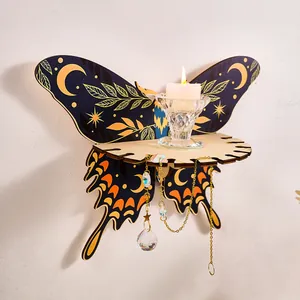 Close-up of butterfly wall shelf detail, wooden celestial moon star decor with hanging crystals.