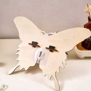 Wooden butterfly shaped wall hanging shelf storage rack for home decor and wall organization.