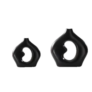 Minimalistisches mattschwarzes bohnenförmiges Keramikvasen-Set für die moderne Wohndeko
