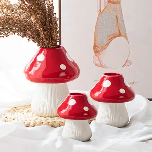 Decorative set of three red mushroom resin vases for creative home floral arrangements