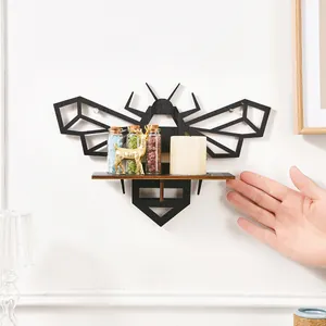 Modern black wooden geometric bee wall shelf for home decor and display storage