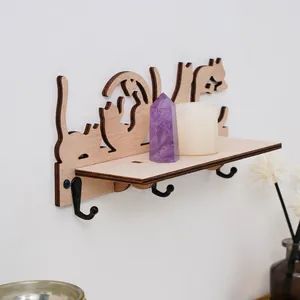 Creative wooden wall shelf with cat 'LOVE' design and three black metal hooks for decor