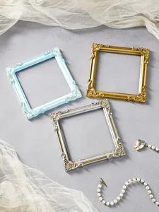 Three vintage ornate baroque square frames in blue, gold, and silver for photo props.