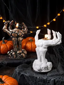 Gotische skelethand kandelaars voor Halloween decoratie met schedelbasis van hars