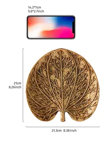Dimensions détaillées pour la décoration murale feuille tropicale en résine dorée.
