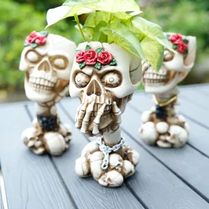 Macro detail of gothic skull planter featuring red rose decor and realistic textures